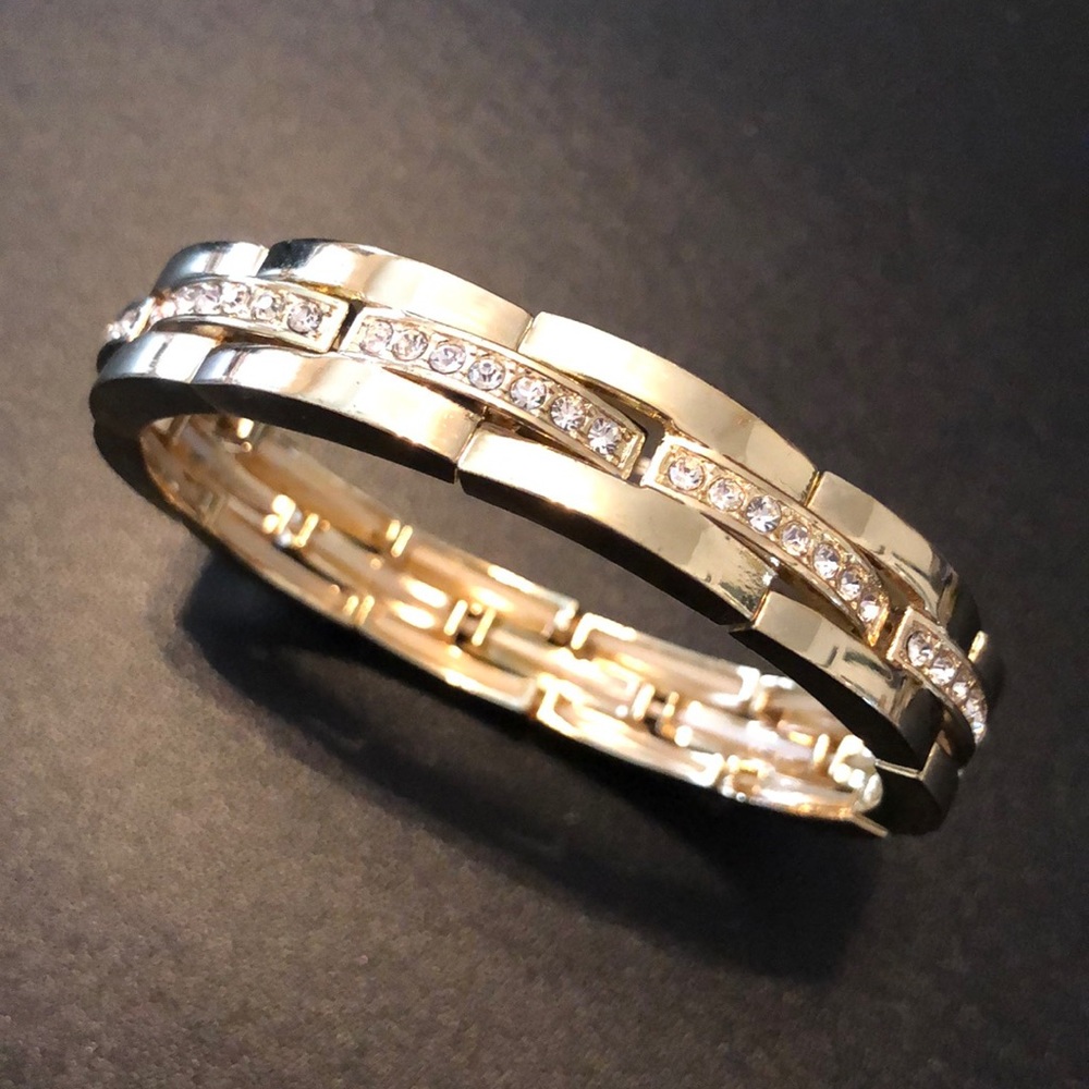 Goldtone ladies bracelet with rhinestones